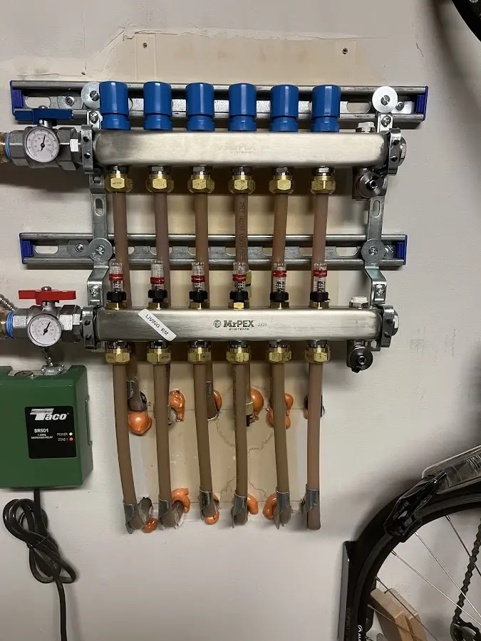 Plumber performing Water Heater Repair at a residential property in Vail